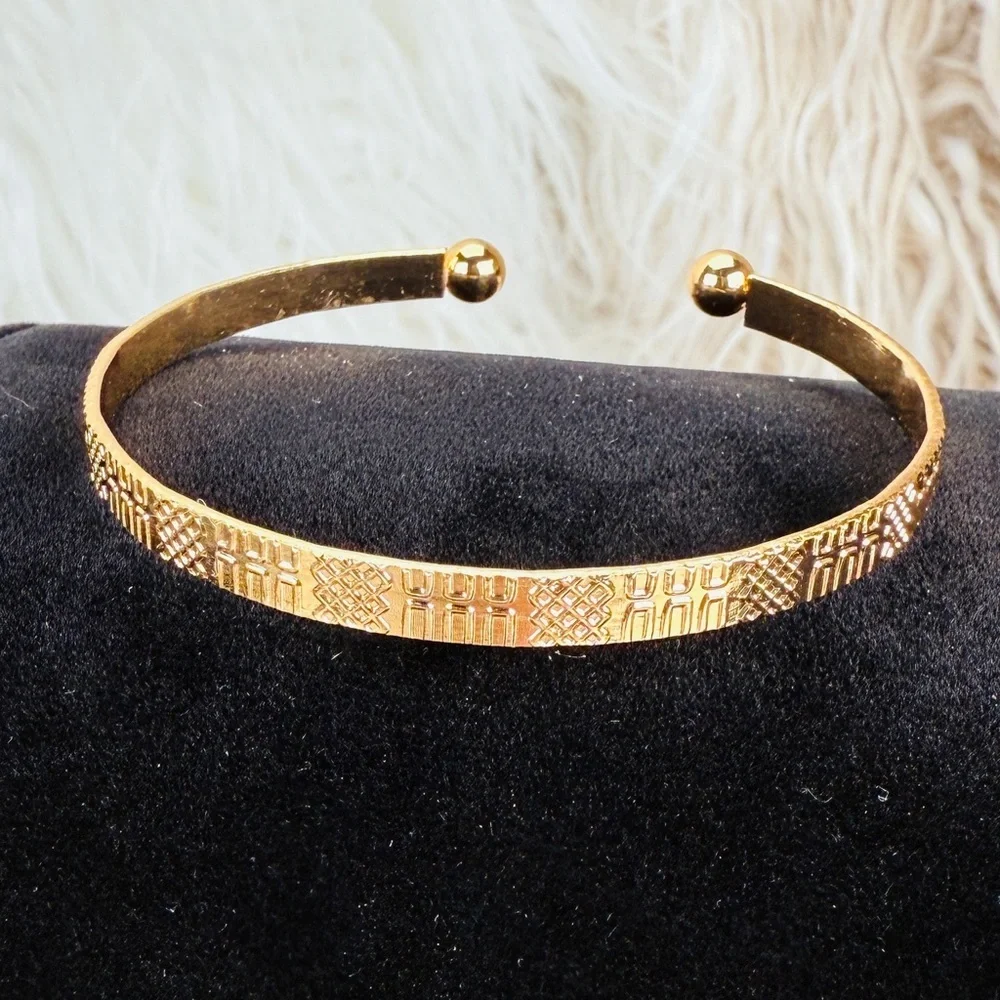 Elegant Goldtone Textured Bangle Bracelet