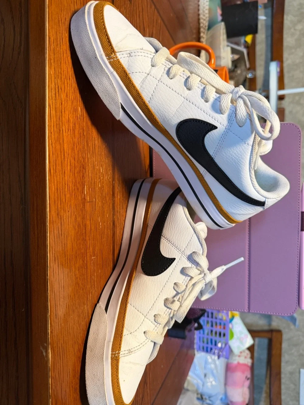 Nike Women’s White Leather Low-Top Sneakers with Black Swoosh
