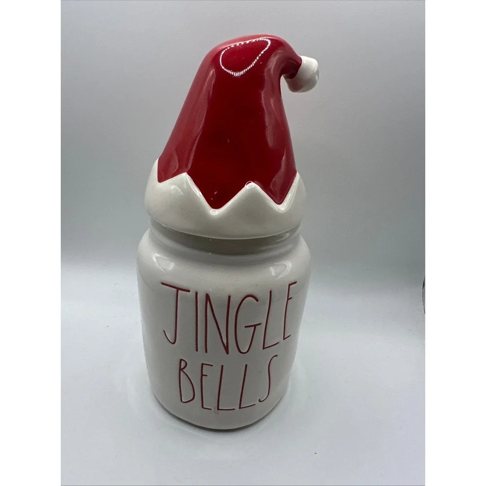Rae Dunn Jingle Bells Christmas Canister with Santa Hat Lid Magenta Ceramic Jar