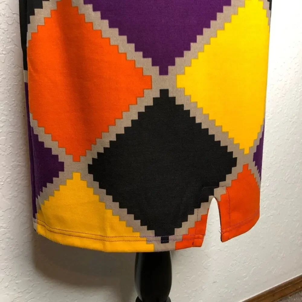 Tracy Negoshian joan orange