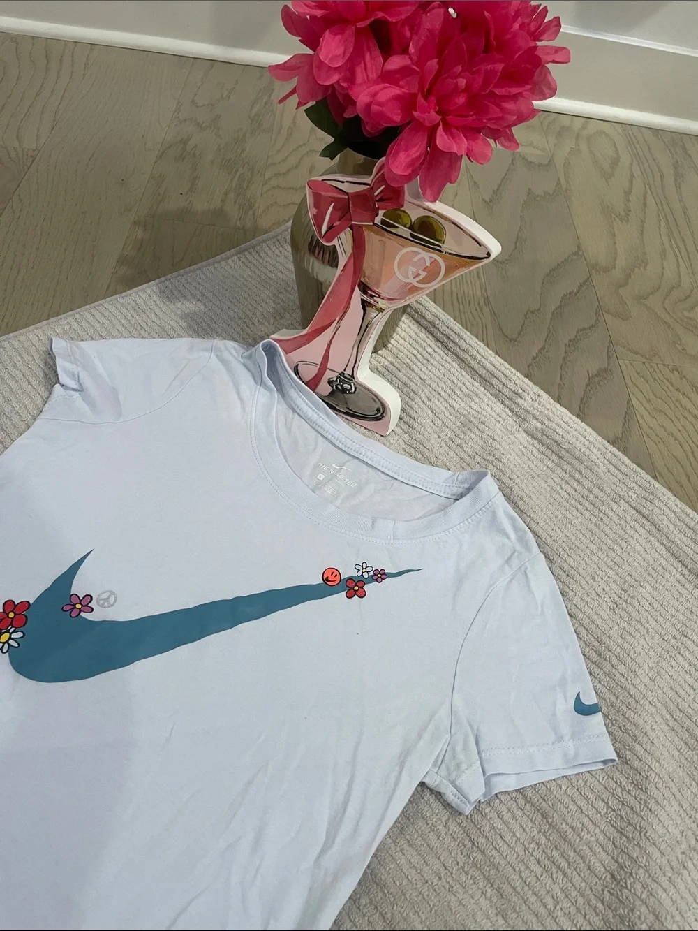 Nike White Tee with Teal Swoosh and Small Floral Accents