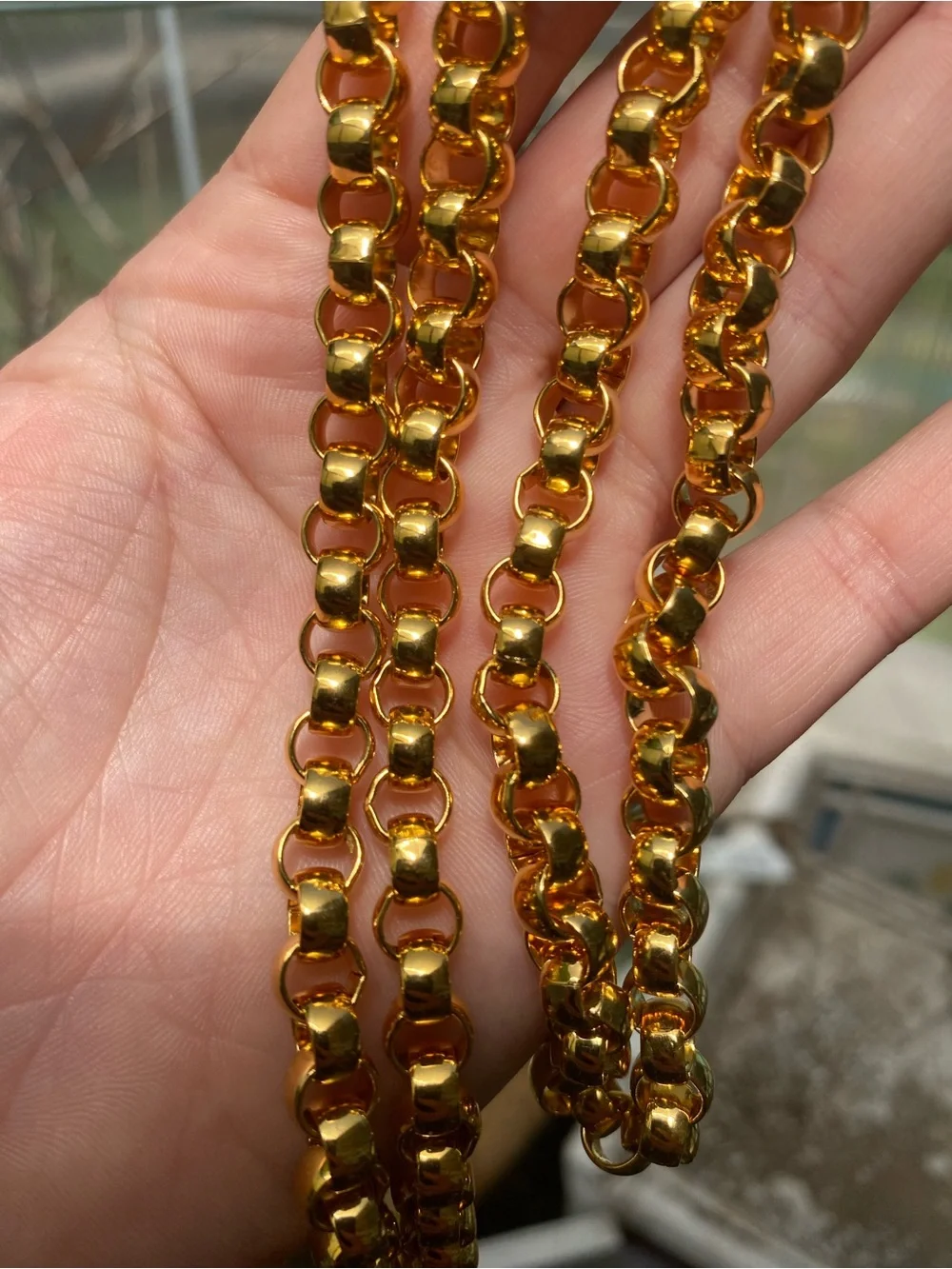 Joan Rivers gold tone