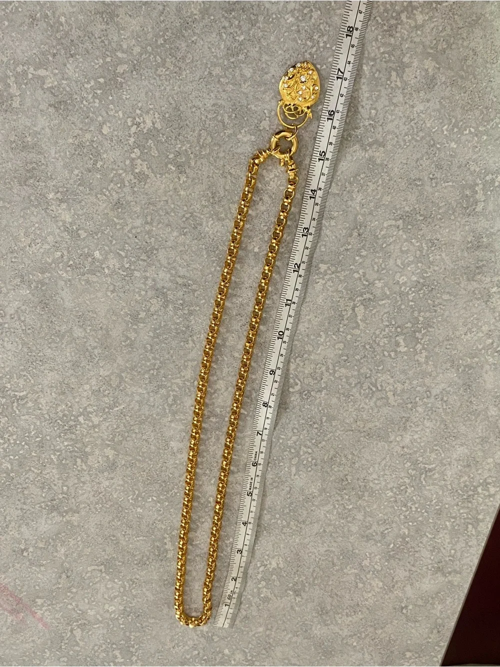 Joan Rivers gold tone