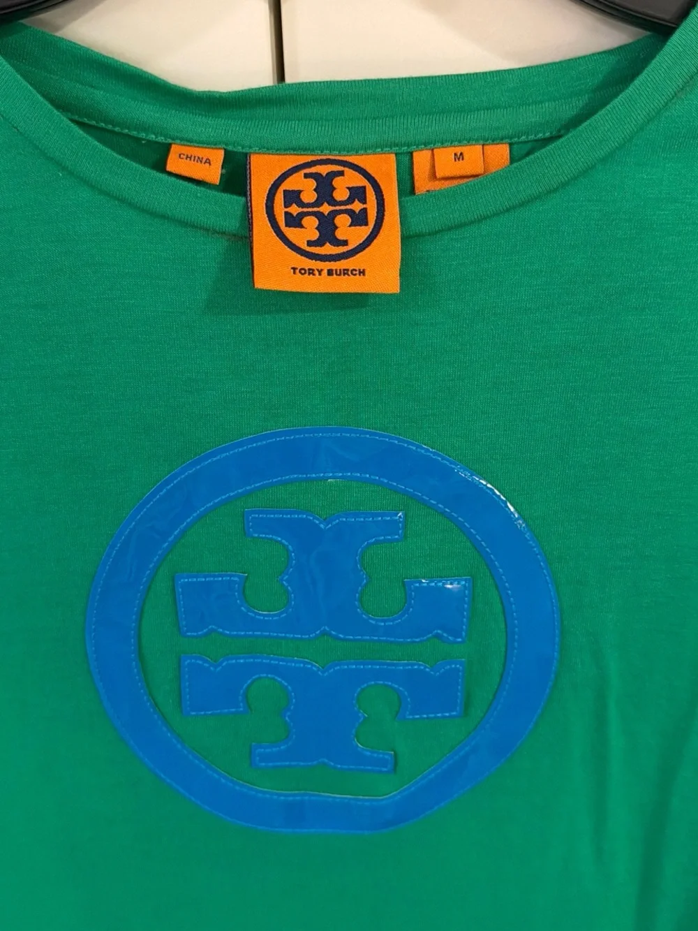 Tory Burch prominent emerald