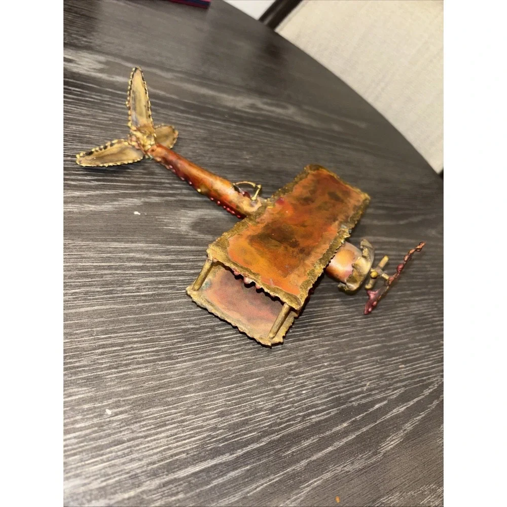 The Unbranded Brand metal airplane