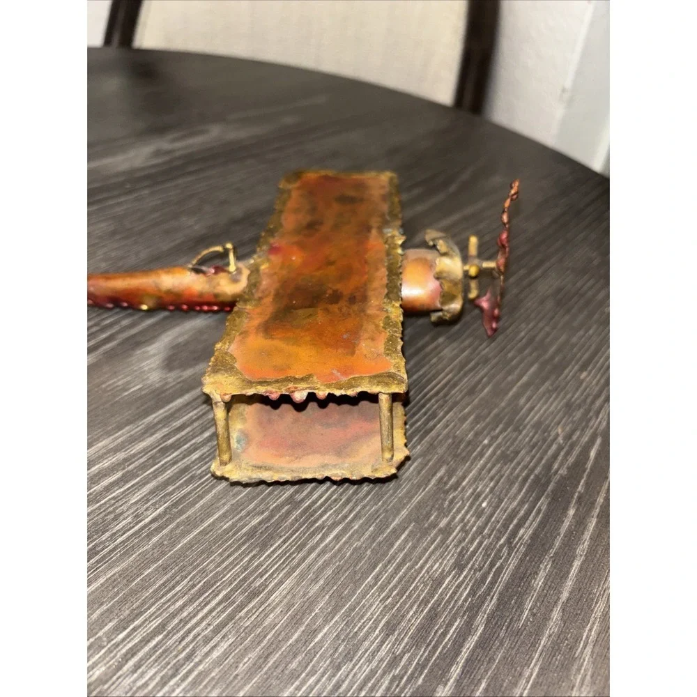 The Unbranded Brand metal airplane