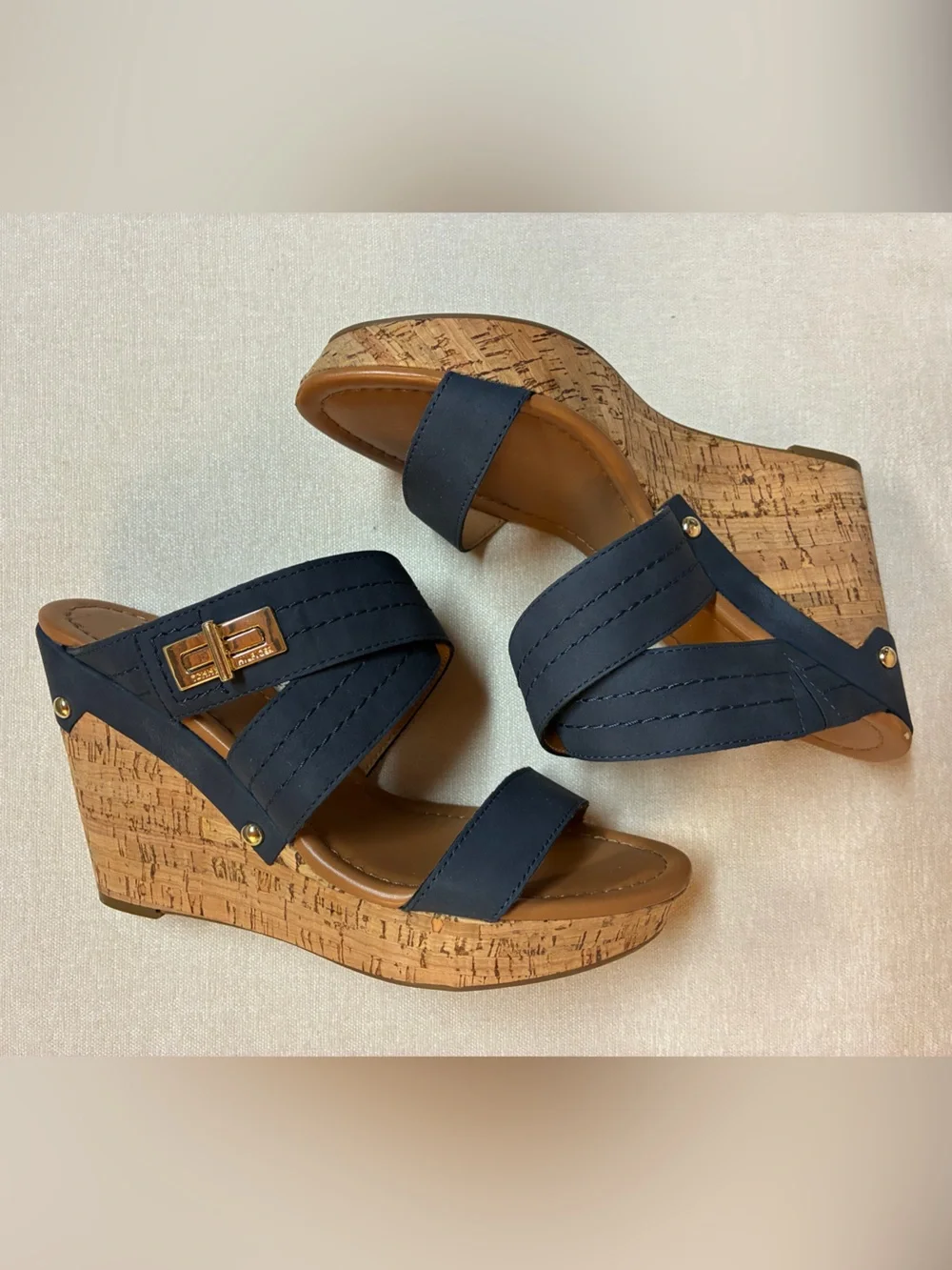Tommy Hilfiger women’s cork wedge slide sandals with gold-tone logo hardware