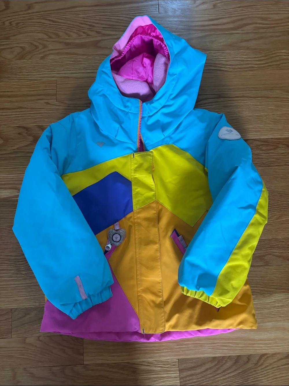Obermeyer Kids Ski Jacket in Turquoise, Yellow & Pink