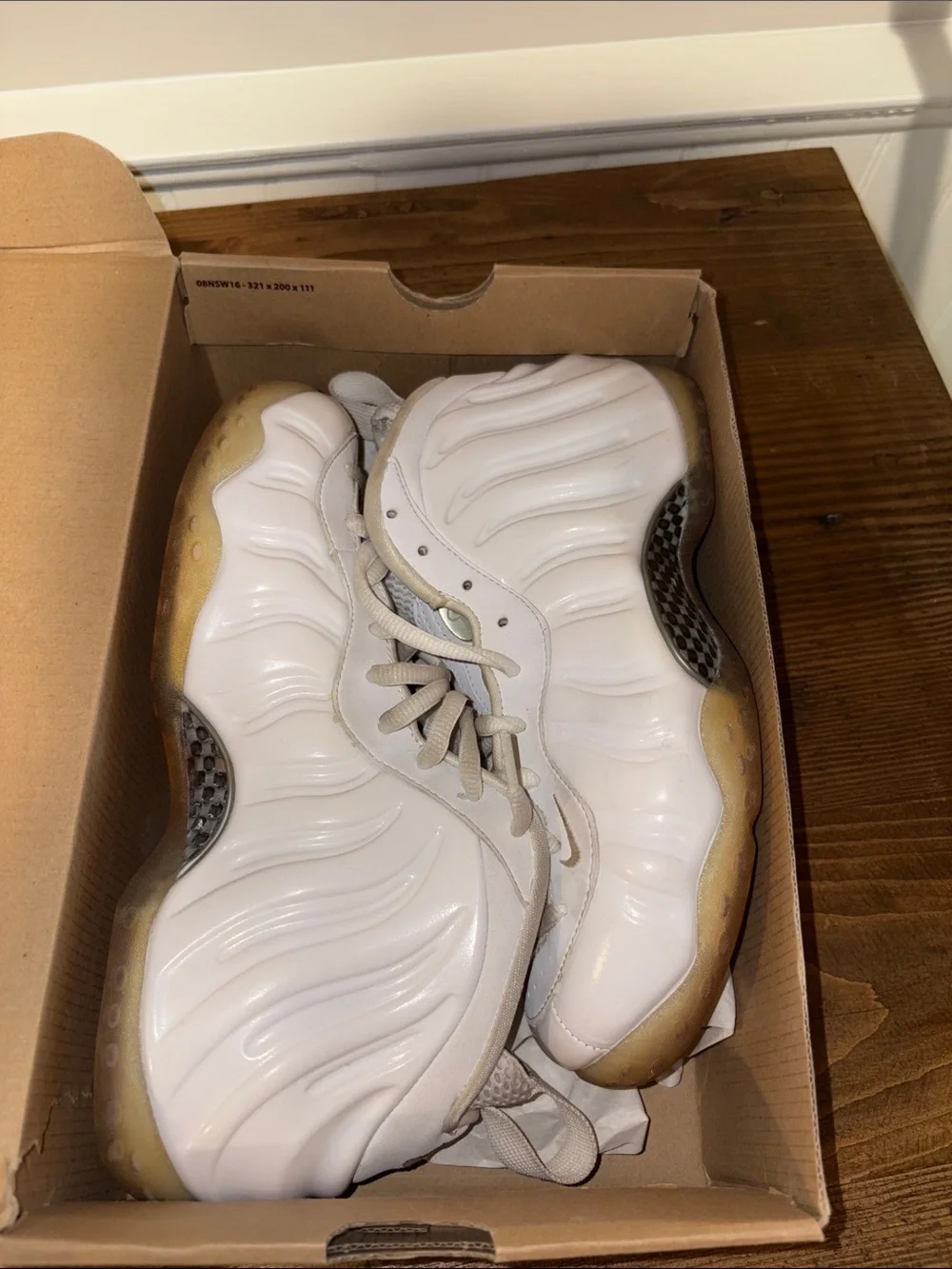 Nike Men’s White Foamposite Sneakers with Yellowed Sole