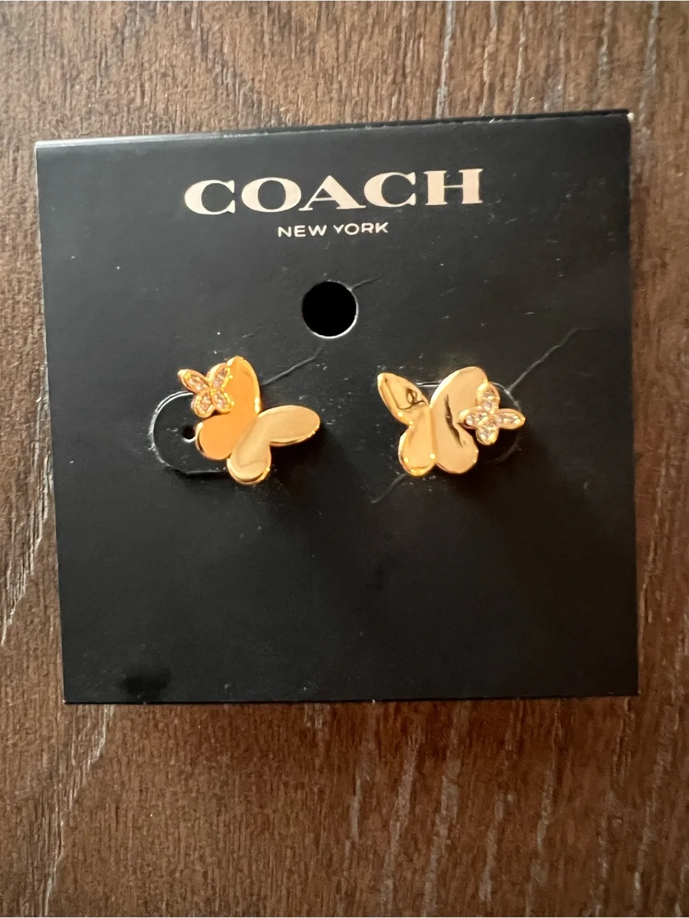 Coach elegant butterfly