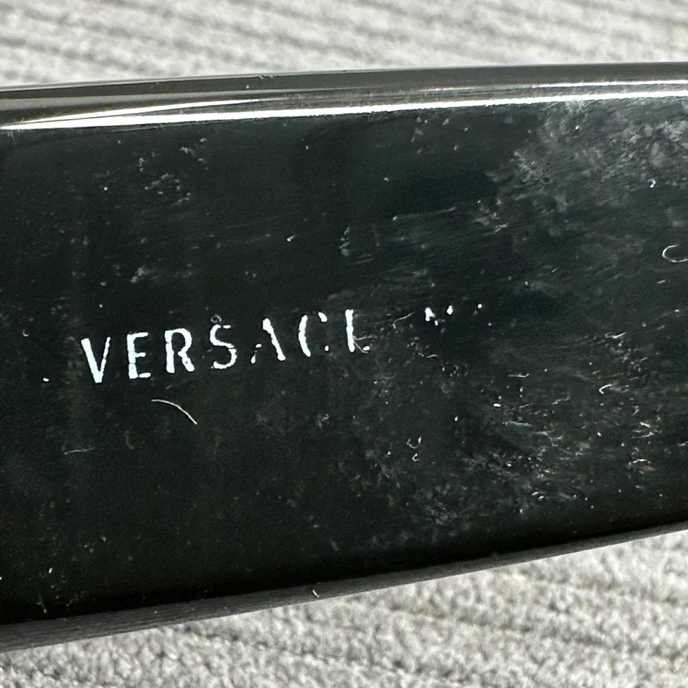 Versace sunglasses featuring