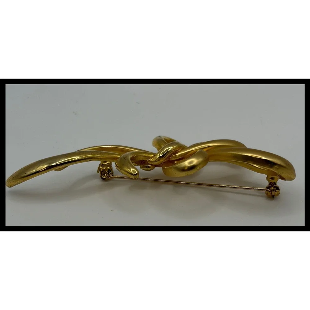 Unbranded bow brooch