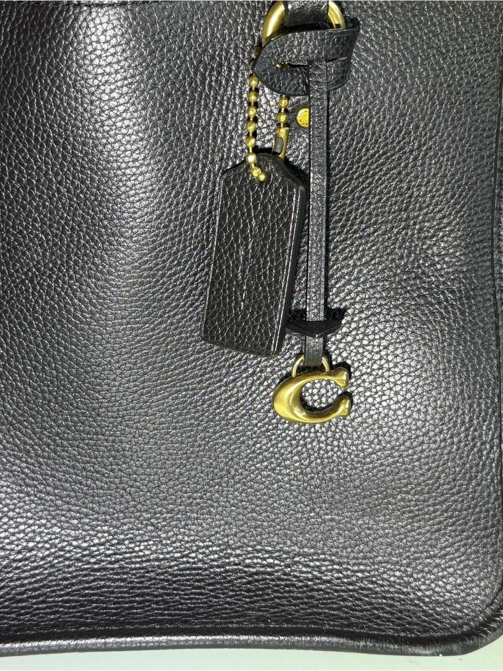 Coach sleek black