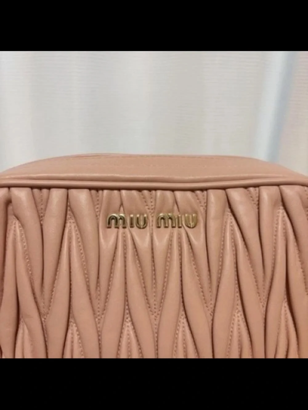 Miu Miu compact quilted