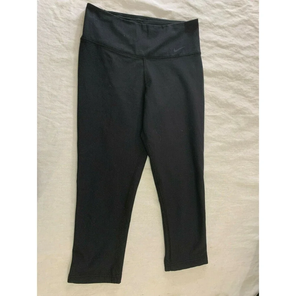 NIKE DRI FIT TEN LESS PLASTIC BOTTLES WOMENS YOGA CAPRIS PANTS SIZE XS