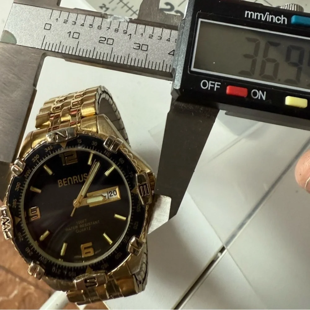 Benrus Men’s Gold-Tone Black Dial Date Watch