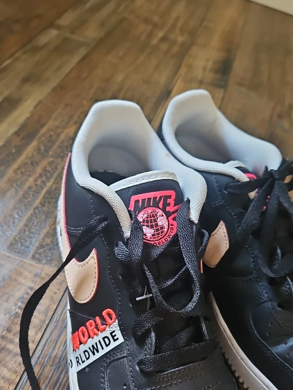 Nike Air Black Leather Sneakers with Peachy Pink Swoosh & World Worlwide Emblem