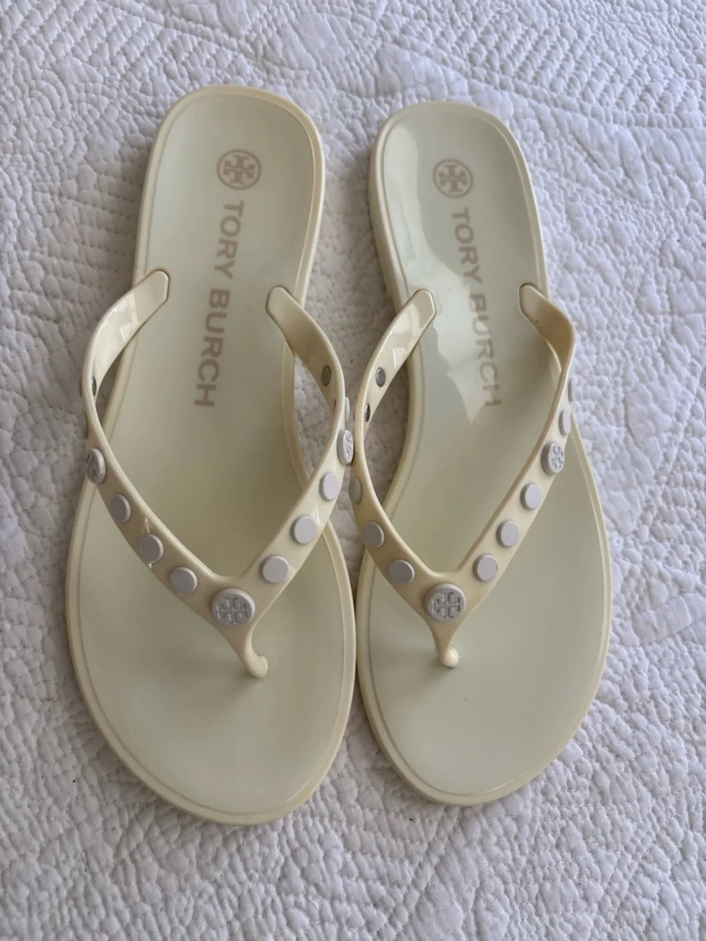 Tory Burch Ivory/pale yellow thong jelly  sandals size 7. Studded w/metal logos