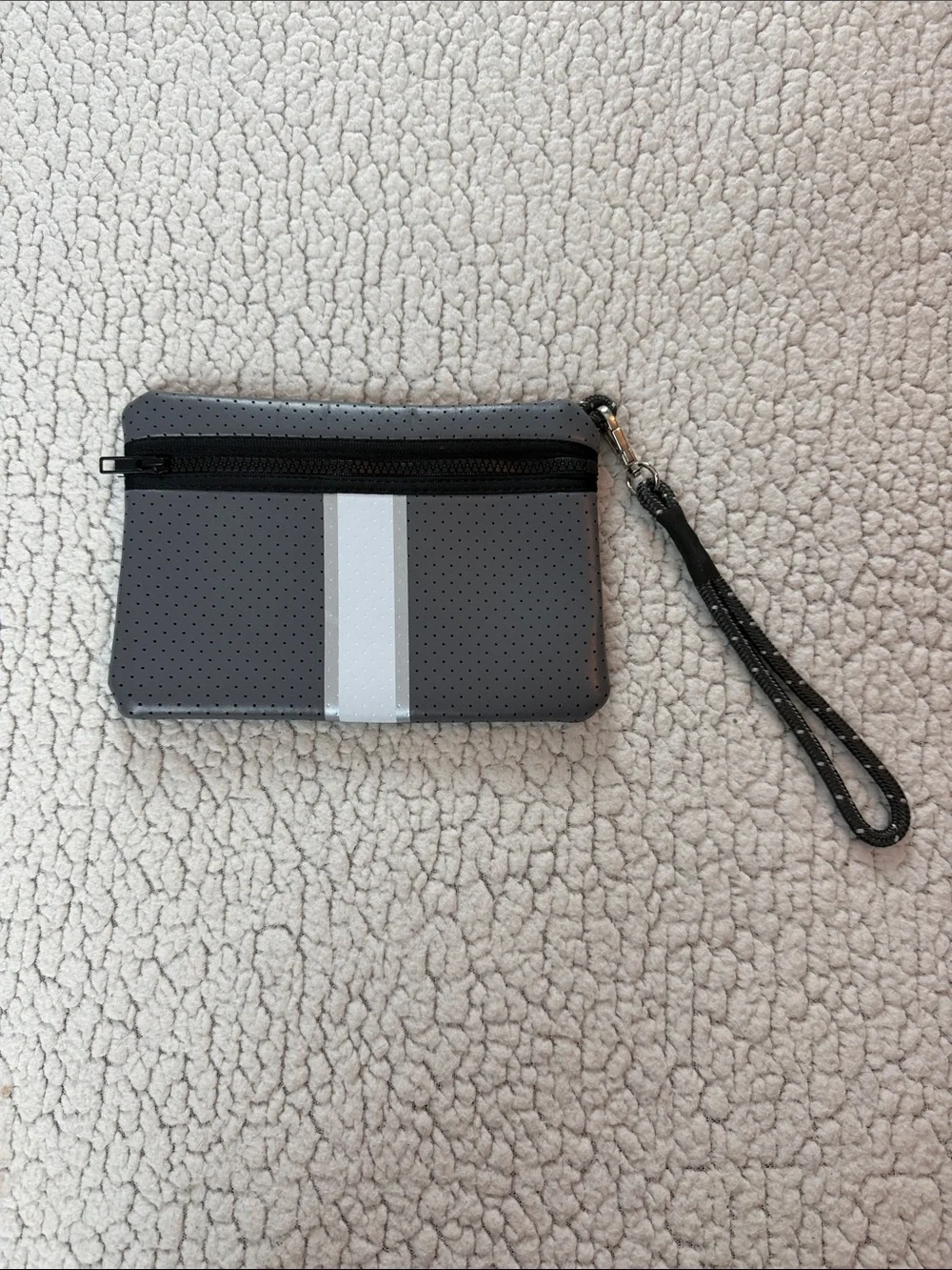 Perforated Gray Wristlet with Stripe Accent