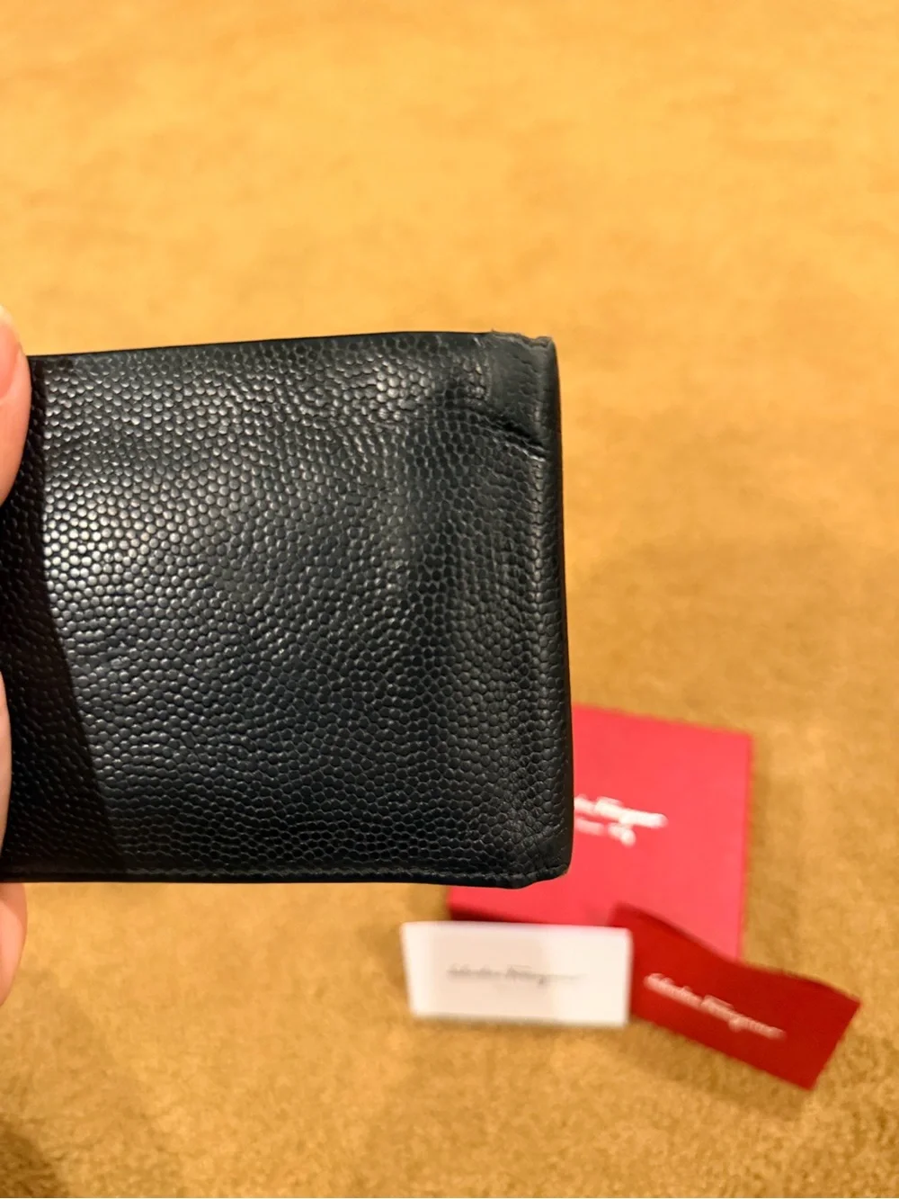 Salvatore Ferragamo Black Pebbled Leather Bi-Fold Wallet with Metal Logo