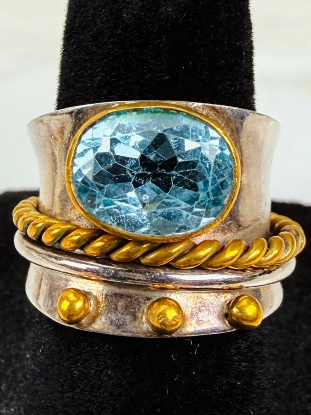 Beautiful size 5 1/2 Silvertone and bronze stamped 925 blue topaz, spinner ring