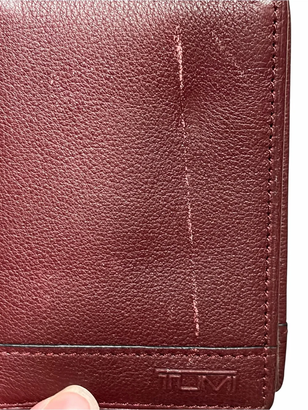 Tumi burgundy leather