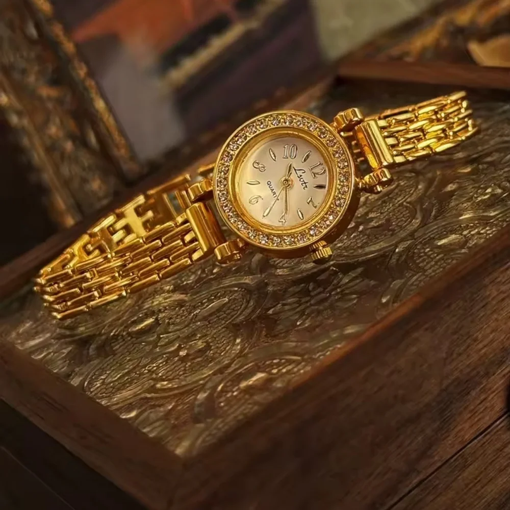Anthropologie luxurious gold