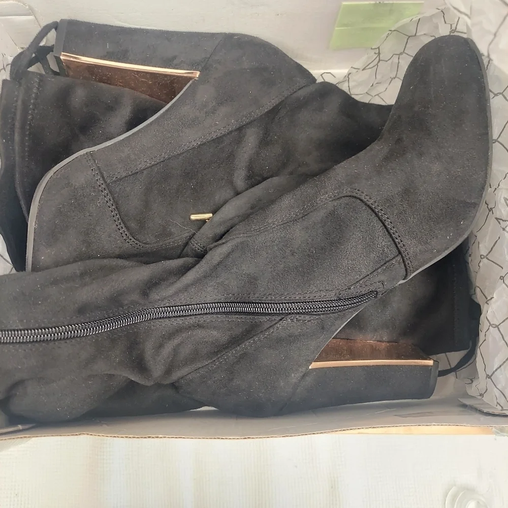 Material Girl black boots questions