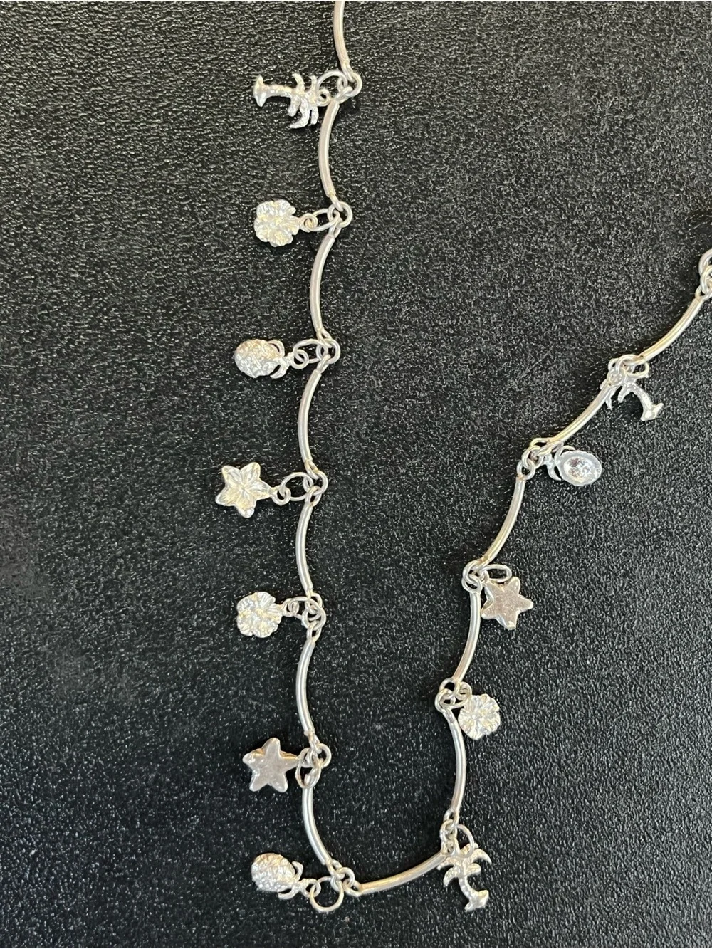 Sterling silver tropical theme anklet. 10”. Starfish, palm trees, pineapple.6.5g