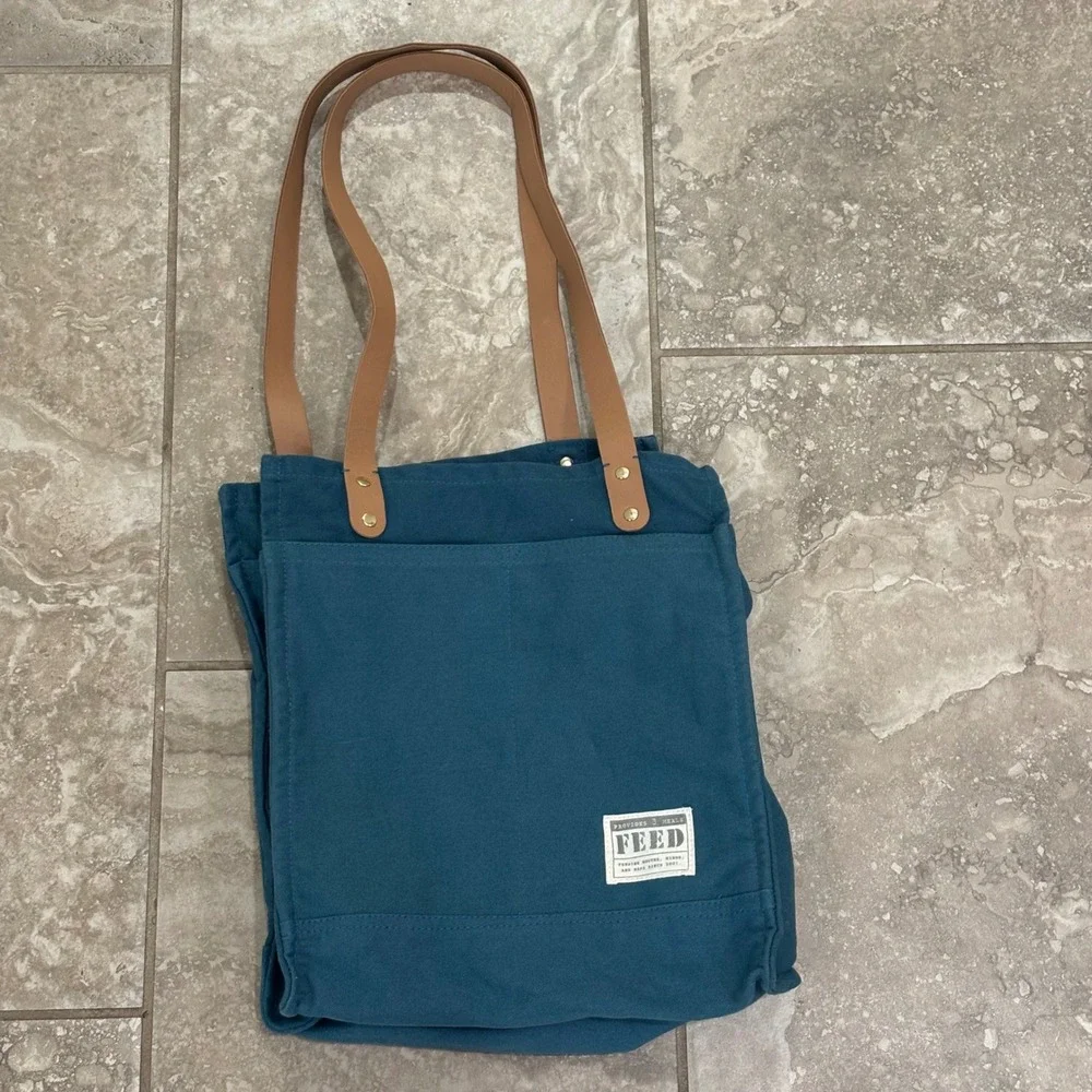 FEED Market Tote Bag Teal Blue Canvas Tan Straps Provides 3 Meals Grocery Bag