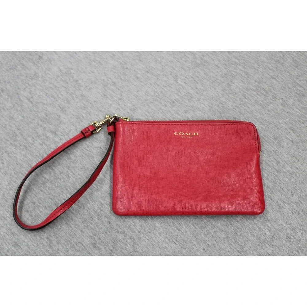 Coach wristlet crafted