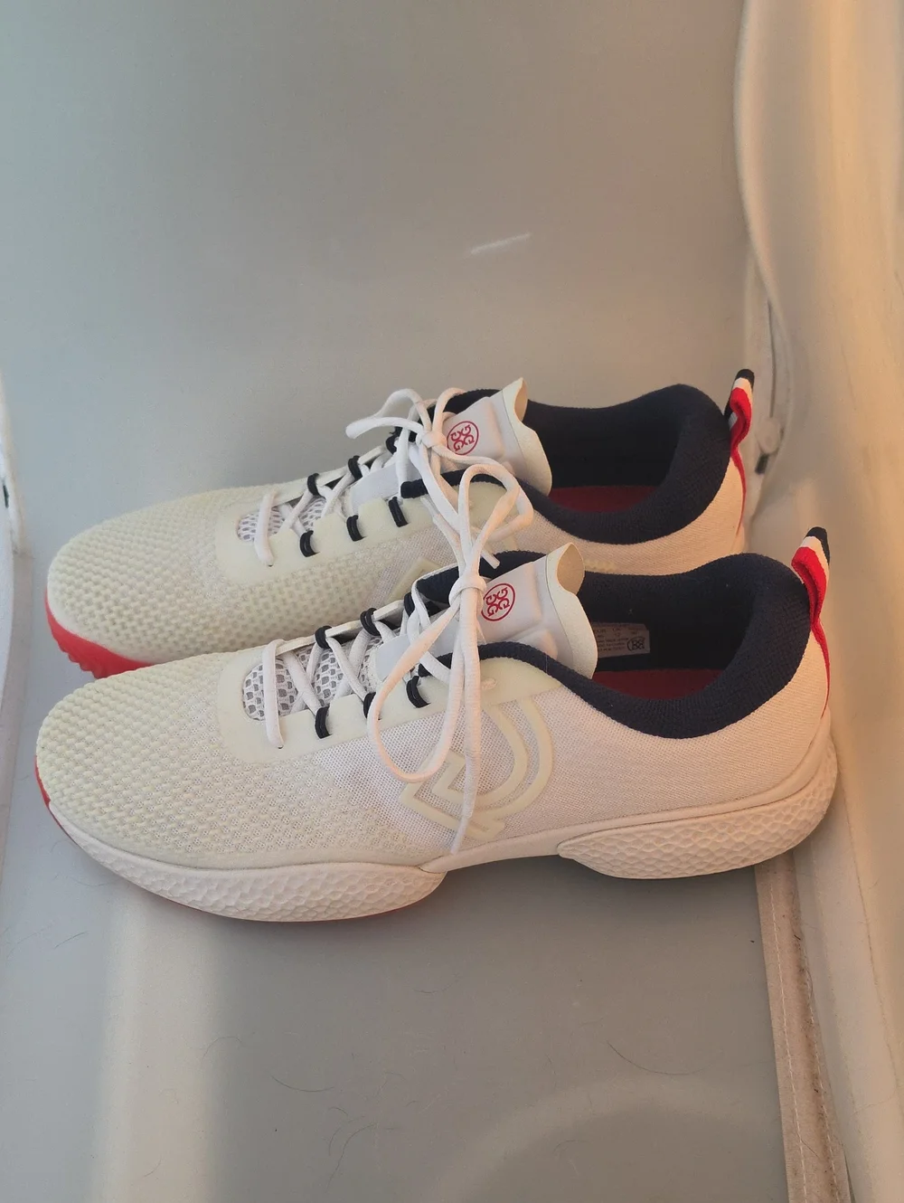 G/FORE  Pickleball Racquet White Sneakers with Navy and Red Accents