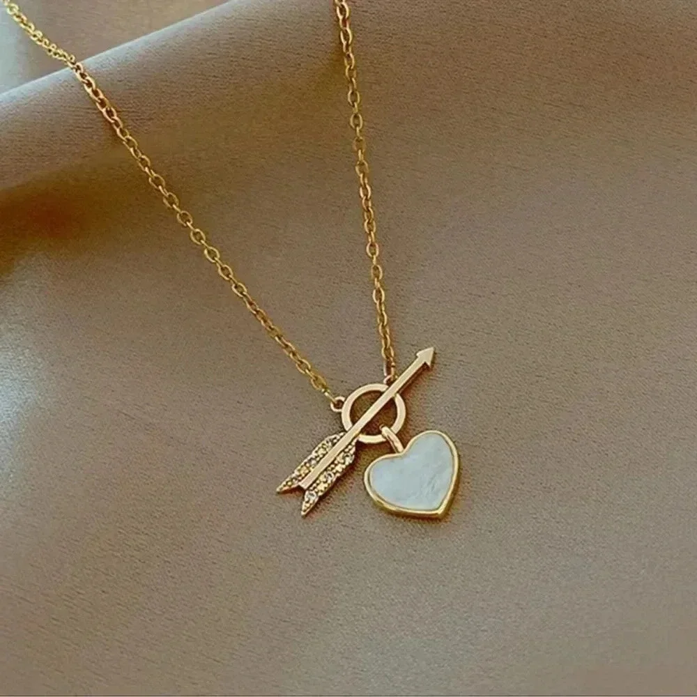 Blossom Boutique gold arrow