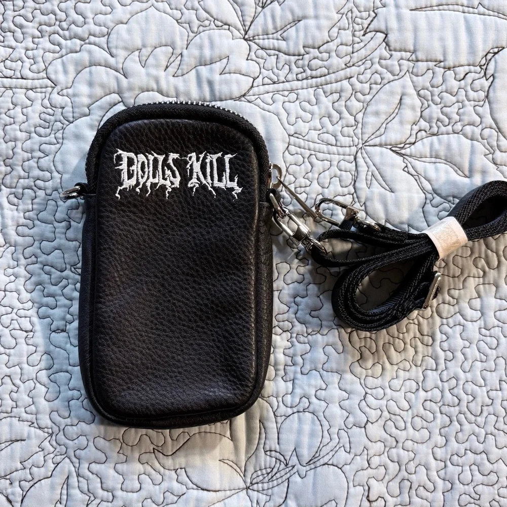 Dolls Kill compact edgy