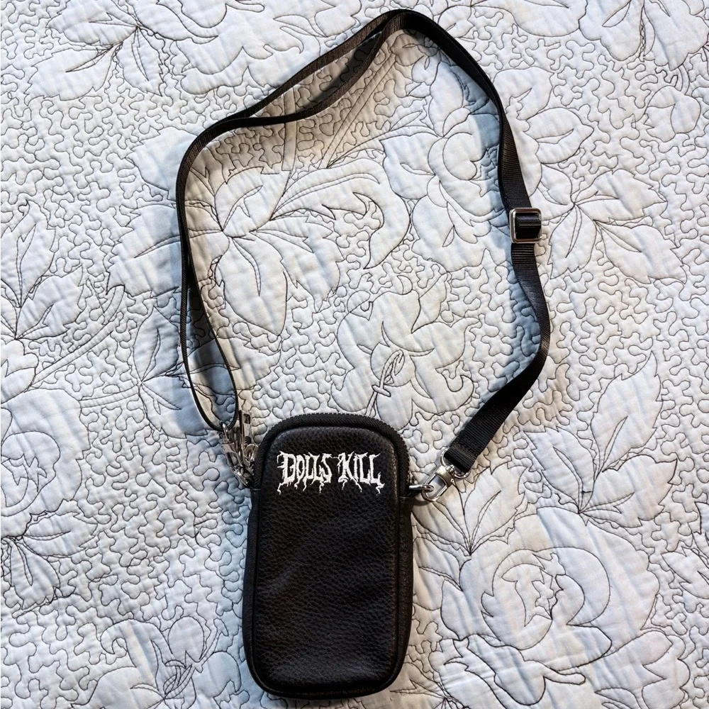 Dolls Kill compact edgy