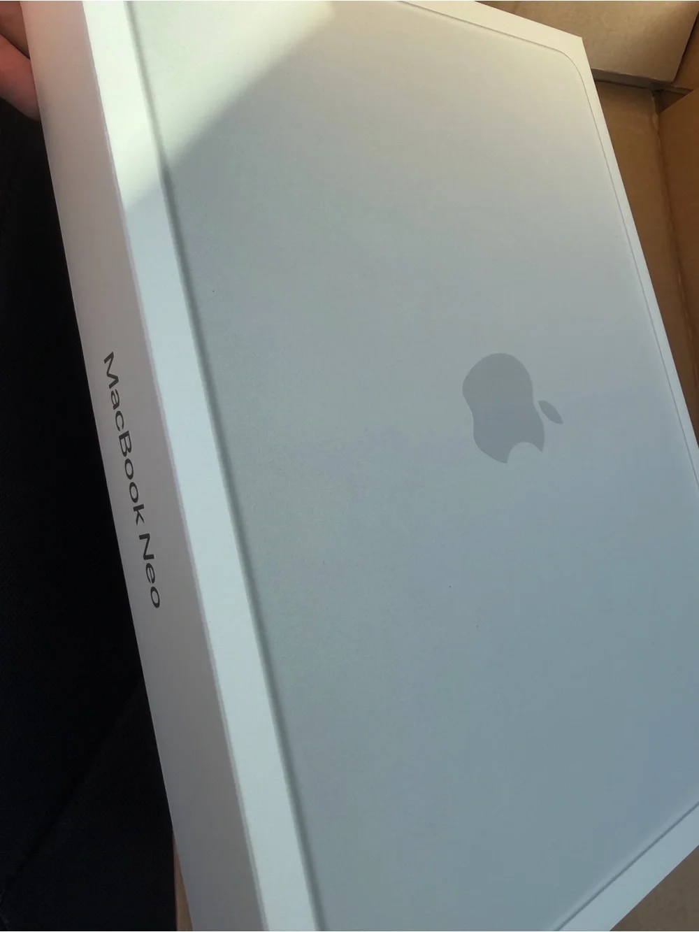 Apple MacBook Neo Silver Box with Apple Logo