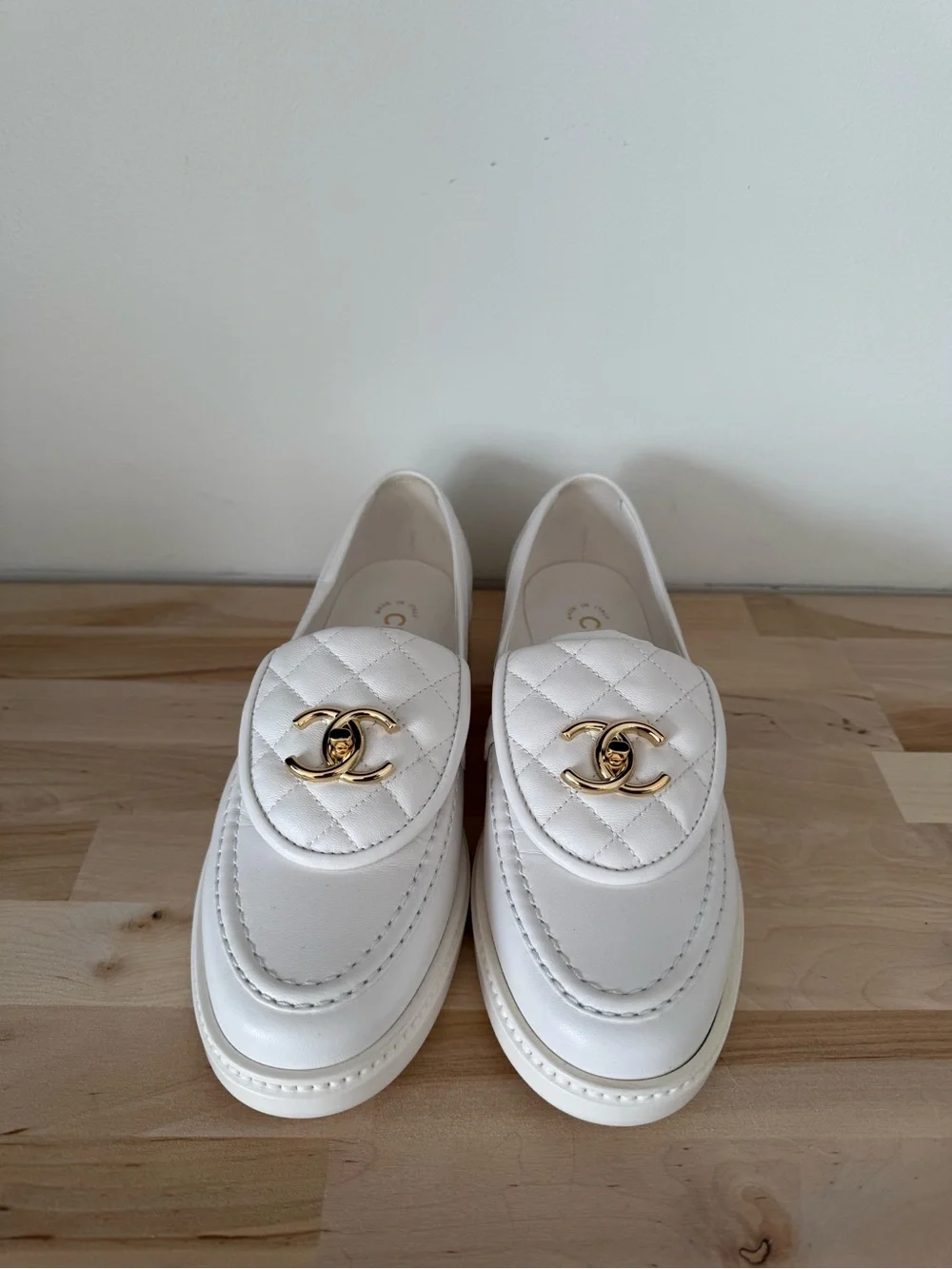 CHANEL White Quilted Turnlock Leather Loafers