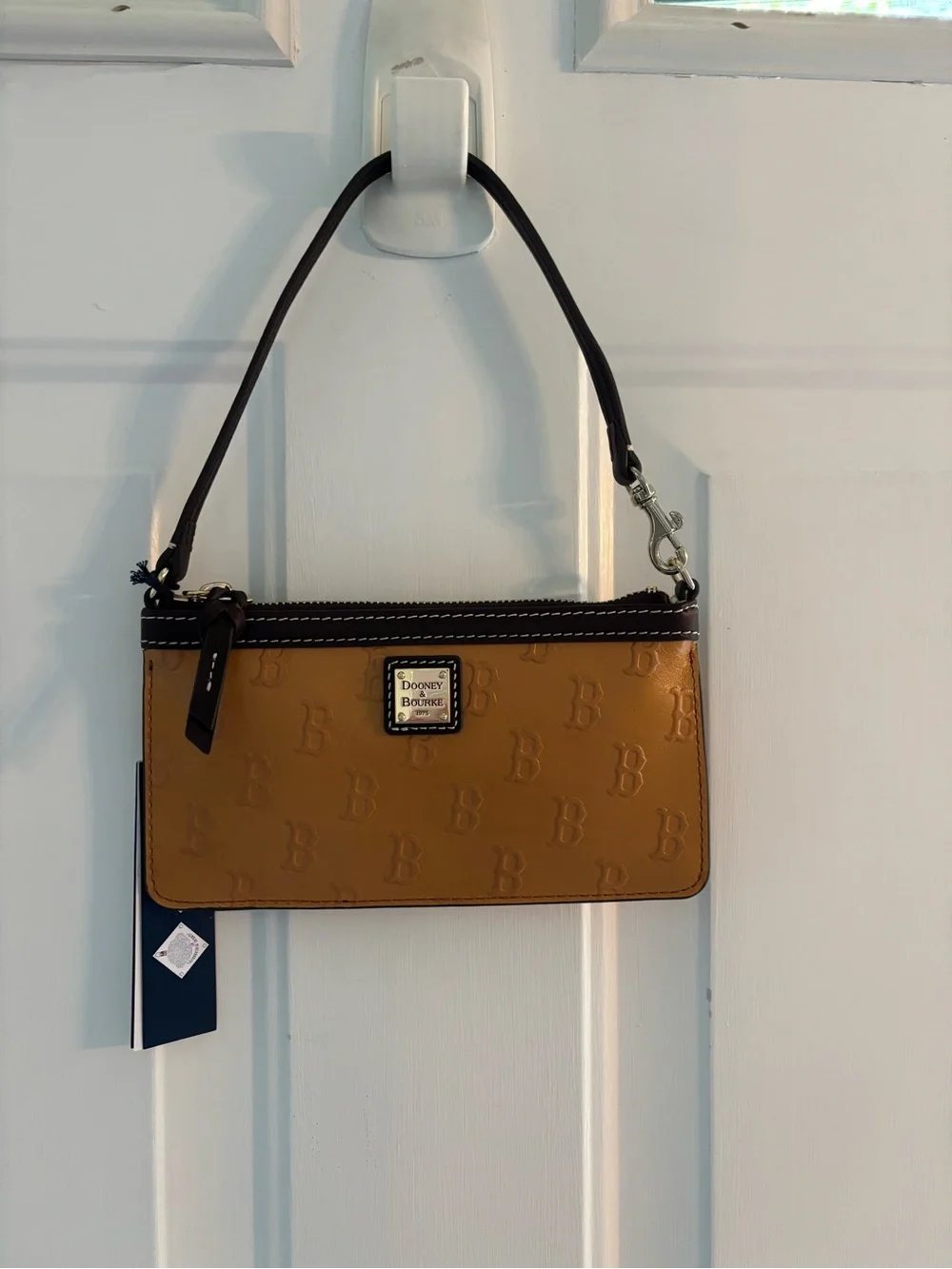 Dooney & Bourke Mustard Yellow Logo-Embossed Wristlet with Brown Trim