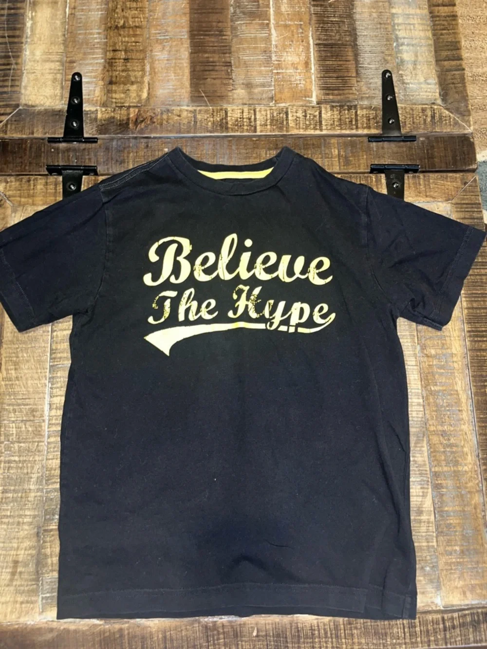 Old Navy Black Tee with Yellow 'Believe The Hype' Graphic