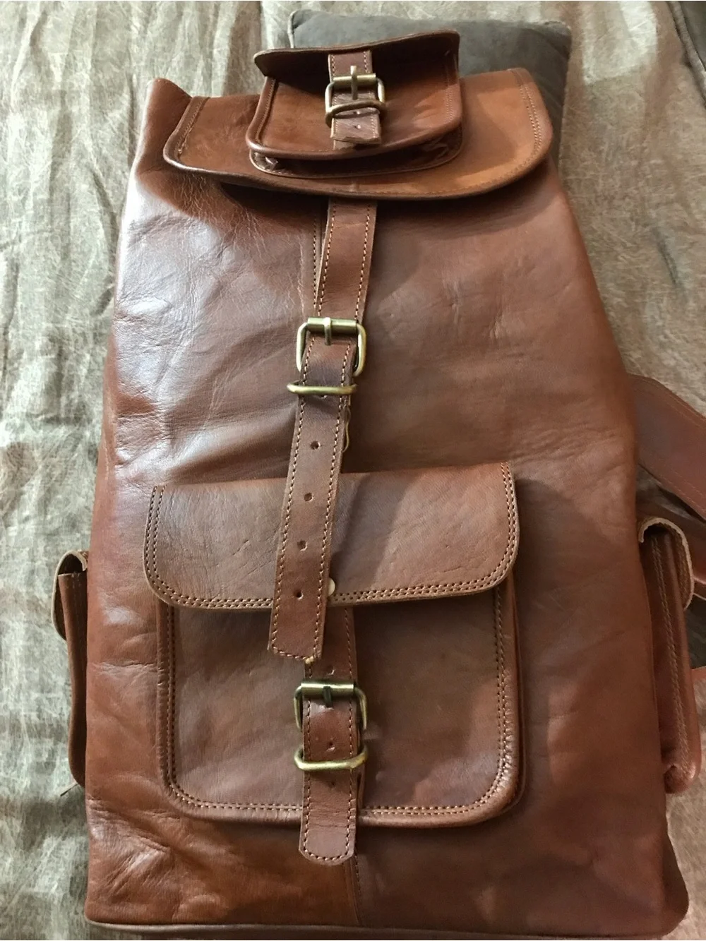 Classic Brown Leather Backpack with Front Buckle Pockets