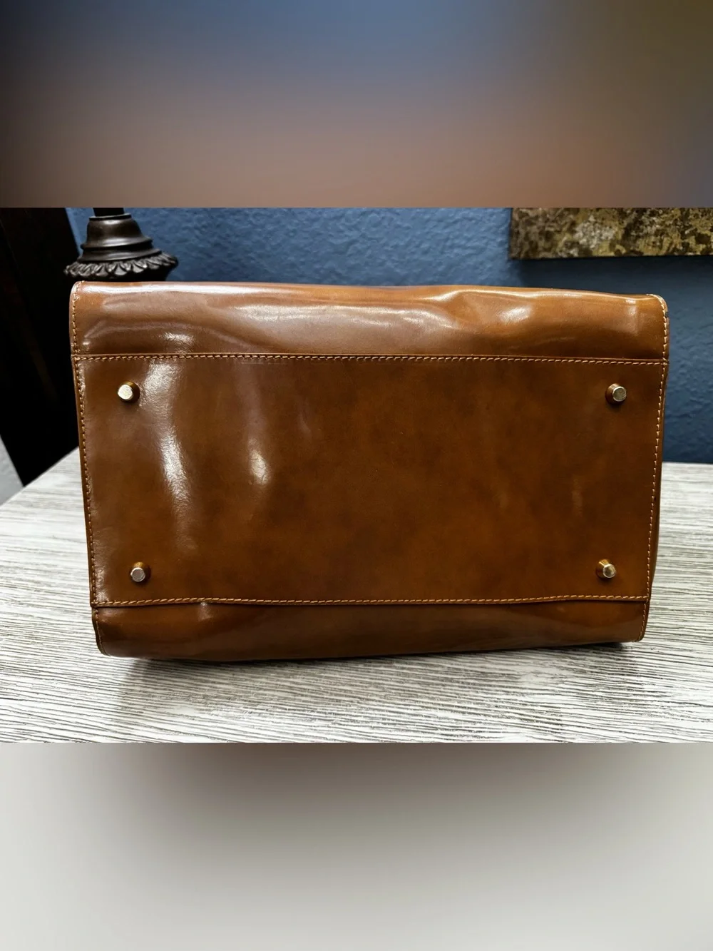 Alberta Di Canio inside satchel