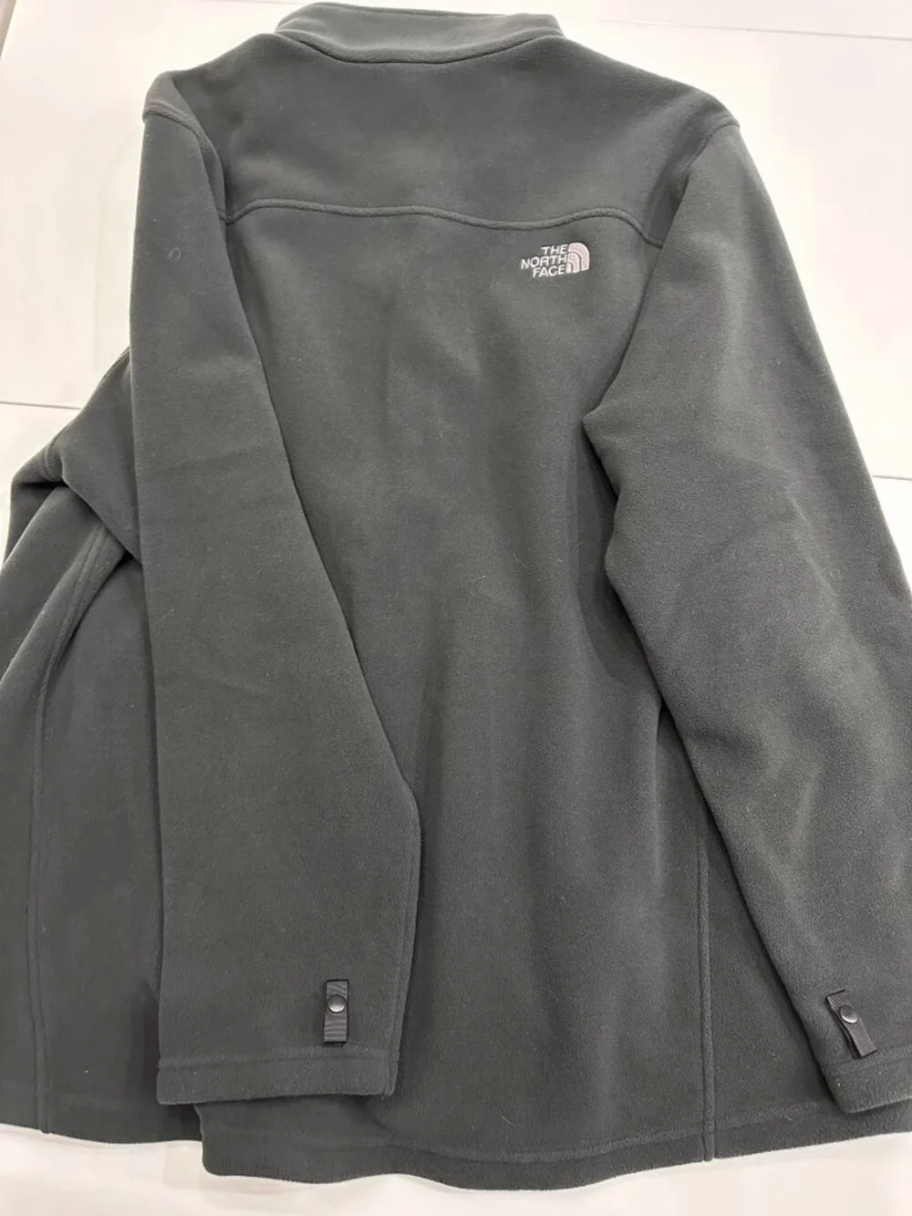 The North Face **fabric zip