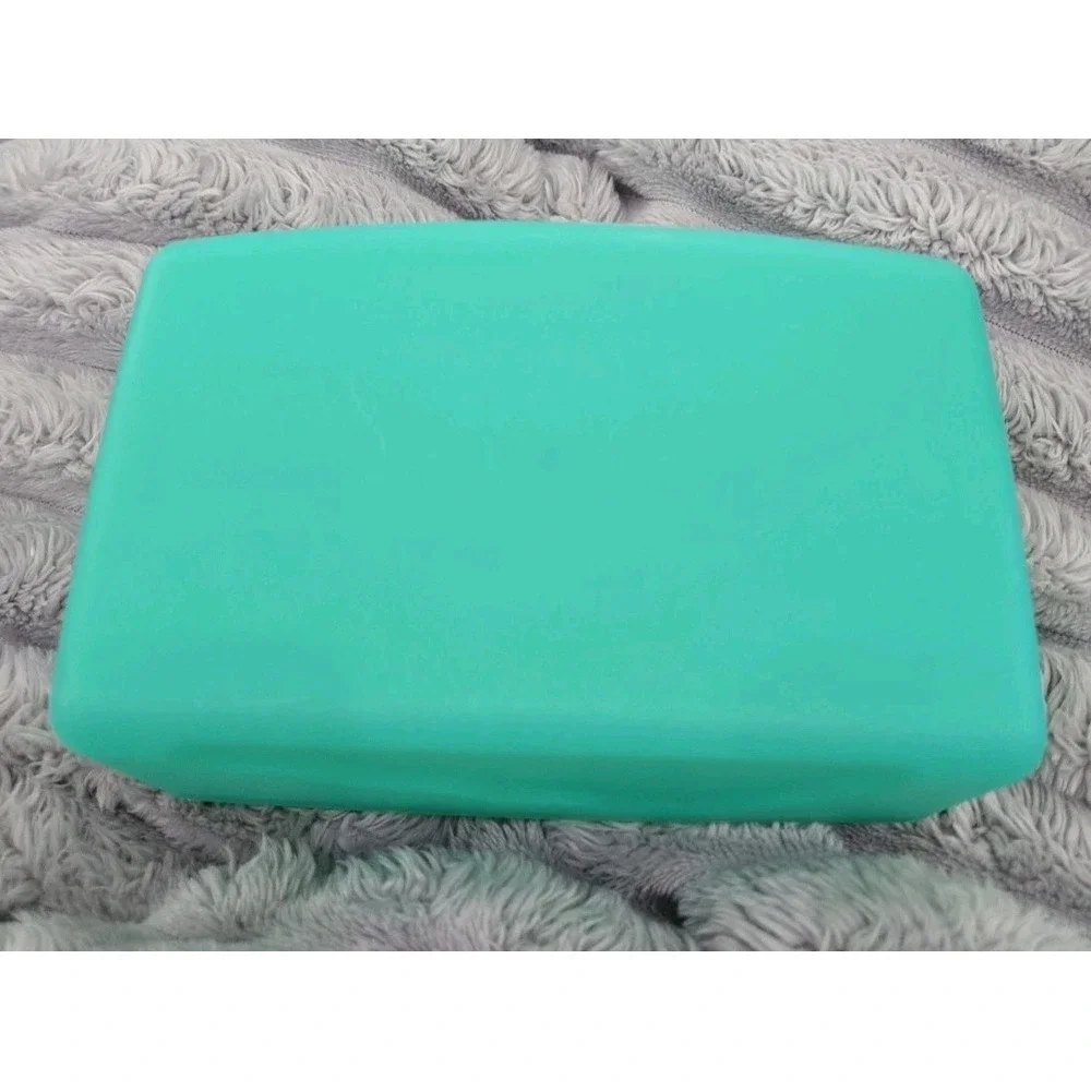 Tupperware teal plastic