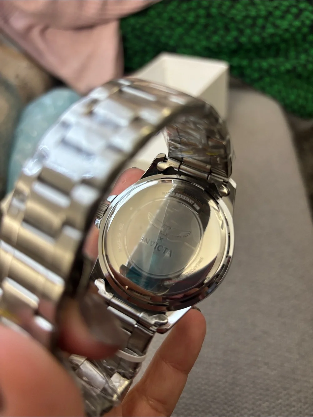 Invicta watch featuring