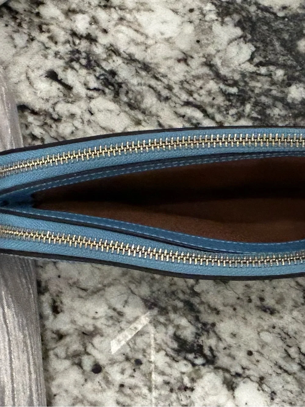 Coach features contrast branded