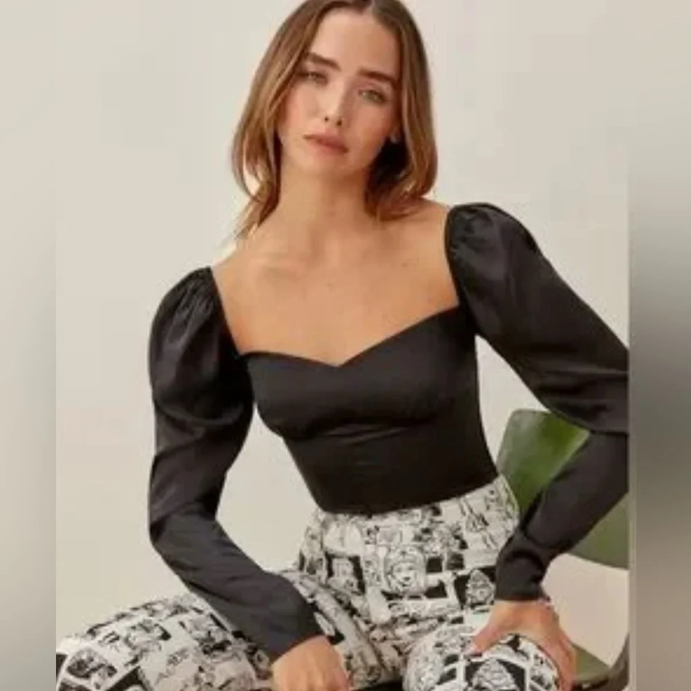 Reformation chic black