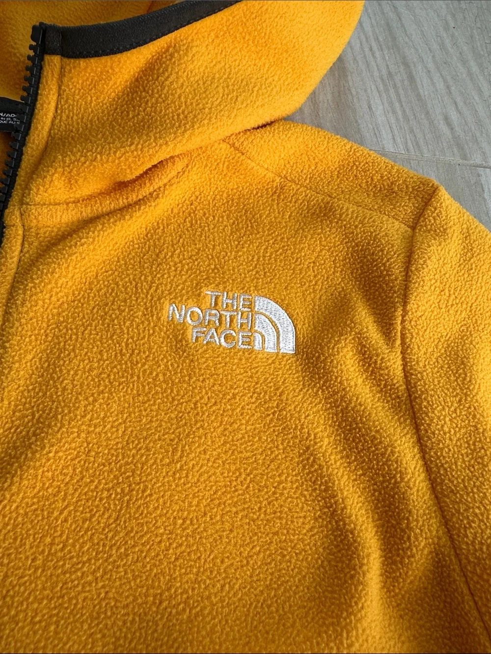 The North Face bright yellow