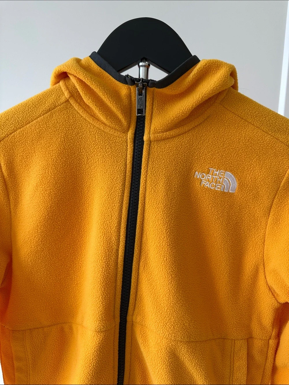The North Face bright yellow