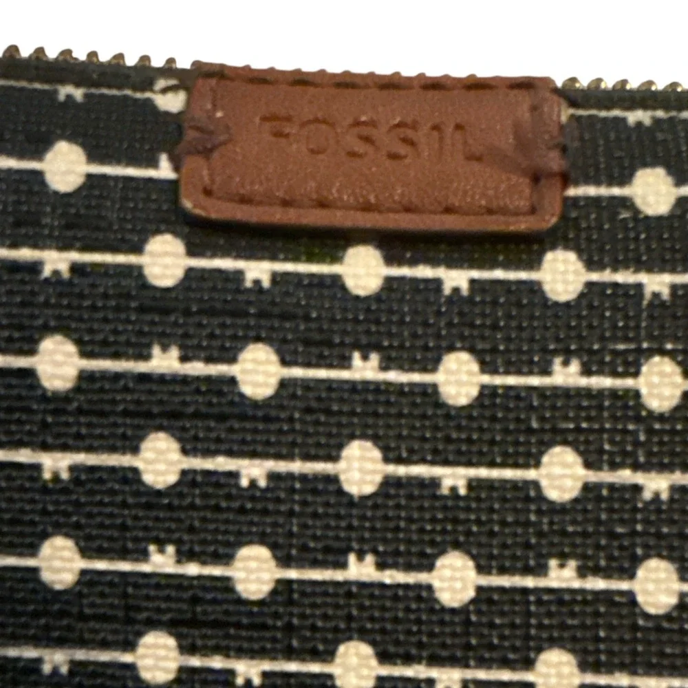Fossil width accents zippered