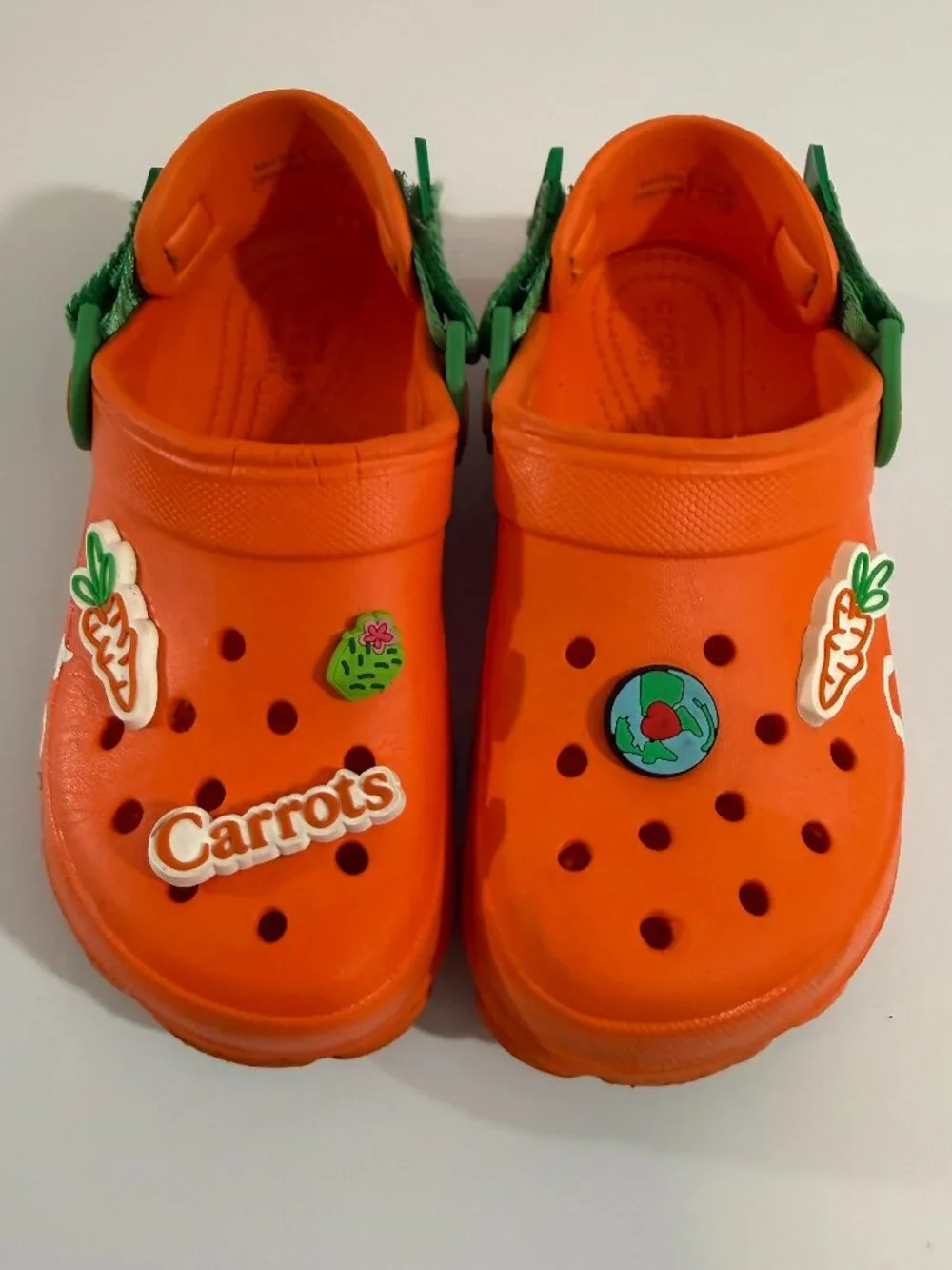 Crocs Carrots clogs with green straps & Croc charms size 1 Junior- gently used